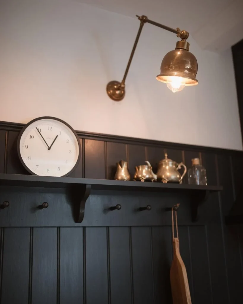 Artisanal ceramic table lamp on a cozy bedside table.