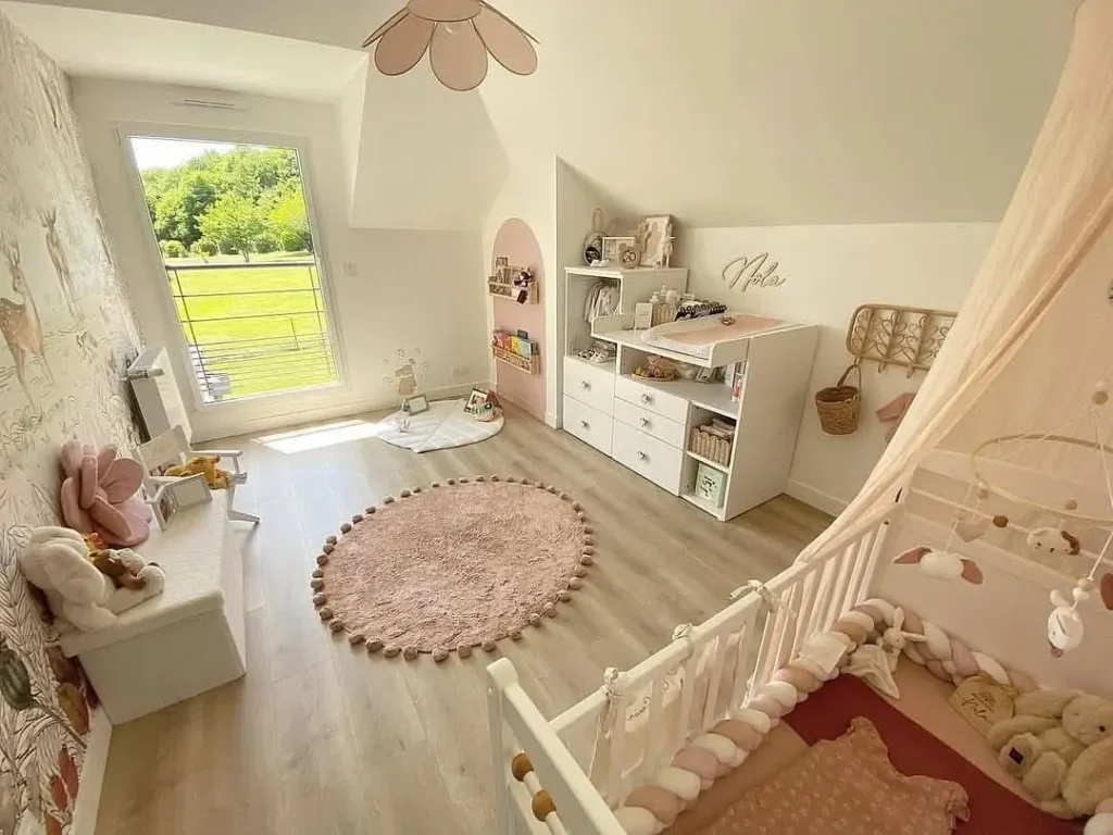 Scandinavian kids room with white walls and geometric art.